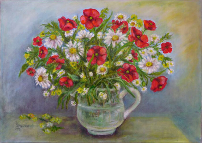 Kytice ve skleněném džbánu